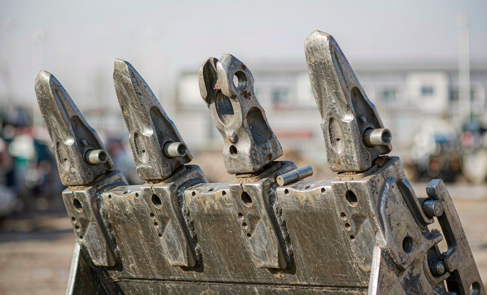 Pin-On vs Weld-On vs Bolt-On Bucket Teeth: Which Should You Specify?